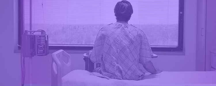 patient sitting on bed in a purple overlay