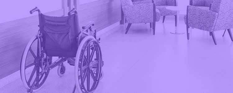 wheelchair in a hospital waiting room in a purple overlay