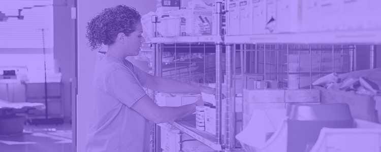 Nurse taking medical supplies in a storage room with a purple overlay