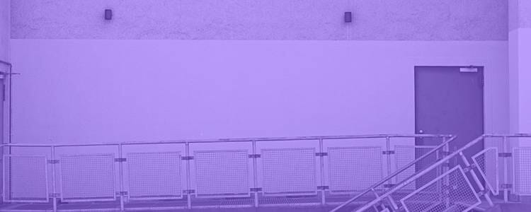 empty stairwell that isnt blocked off in a purple overlay