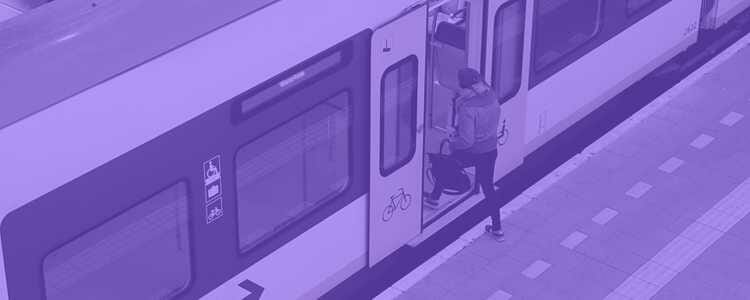 train passenger stepping into the train to start their day with a purple overlay