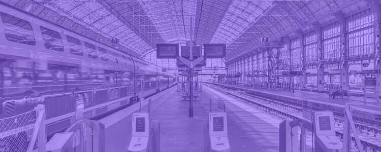 empty train station with a fast train coming through in a purple overlay